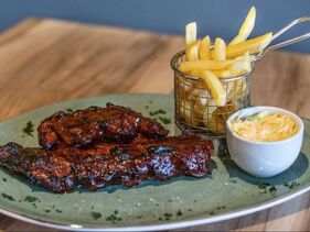 Picture of Picola Italian delicious Pork Ribs dish with Fries